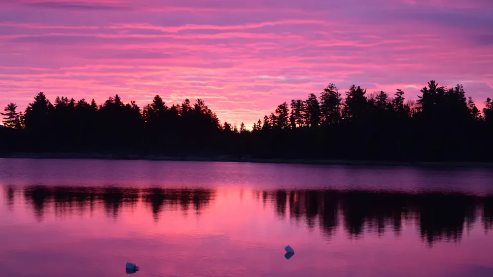 sunrise over moosehead lake maine.